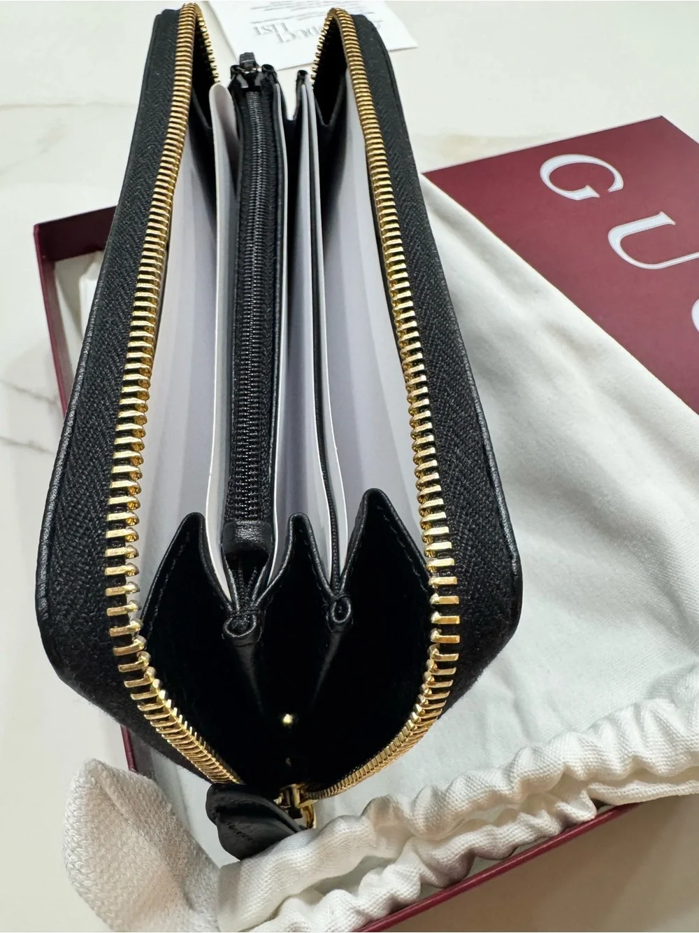 Gucci Black Pebbled Leather Zip Wallet with Gold Logo